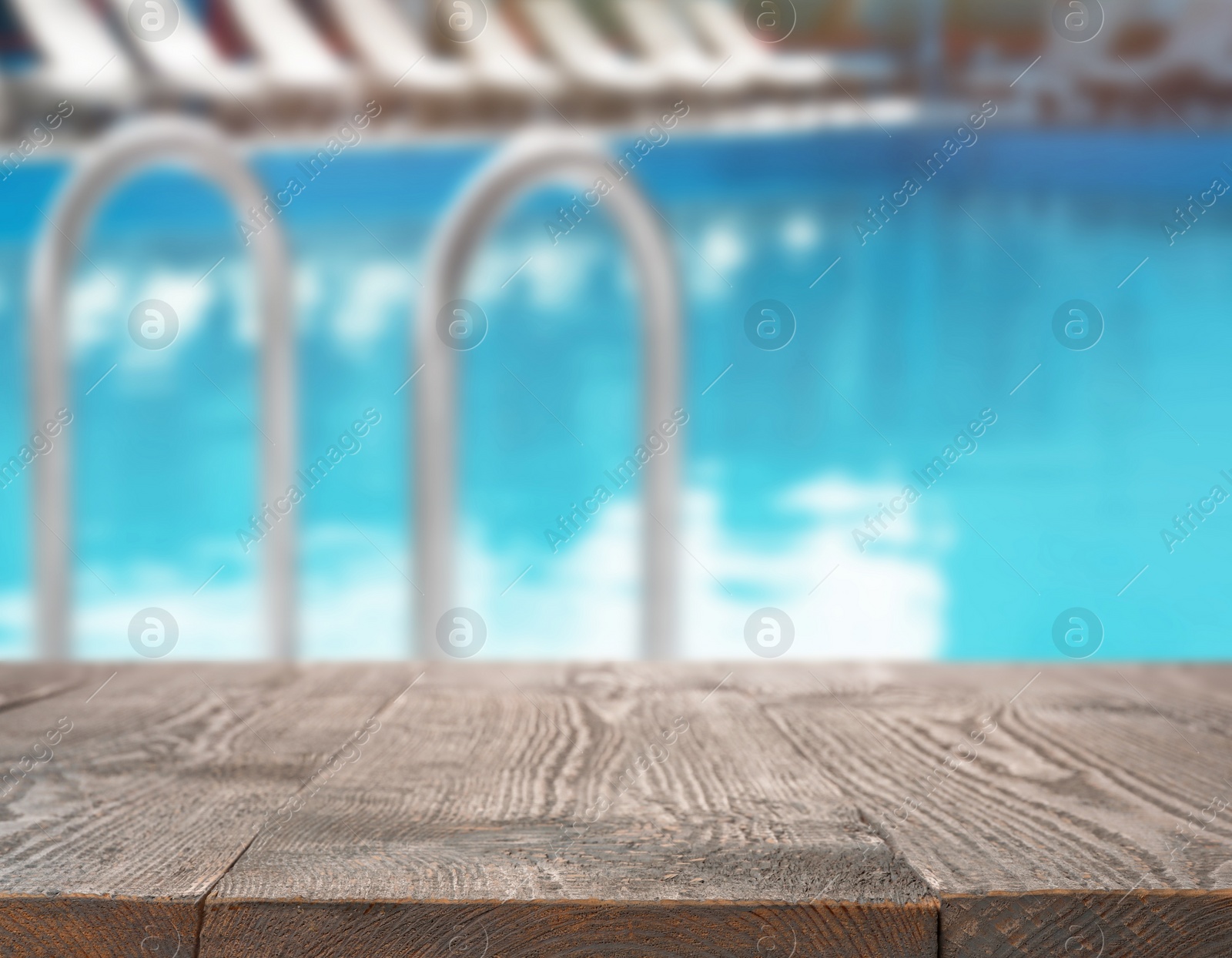 Image of Wooden deck near swimming pool outdoors on sunny day. Space for text