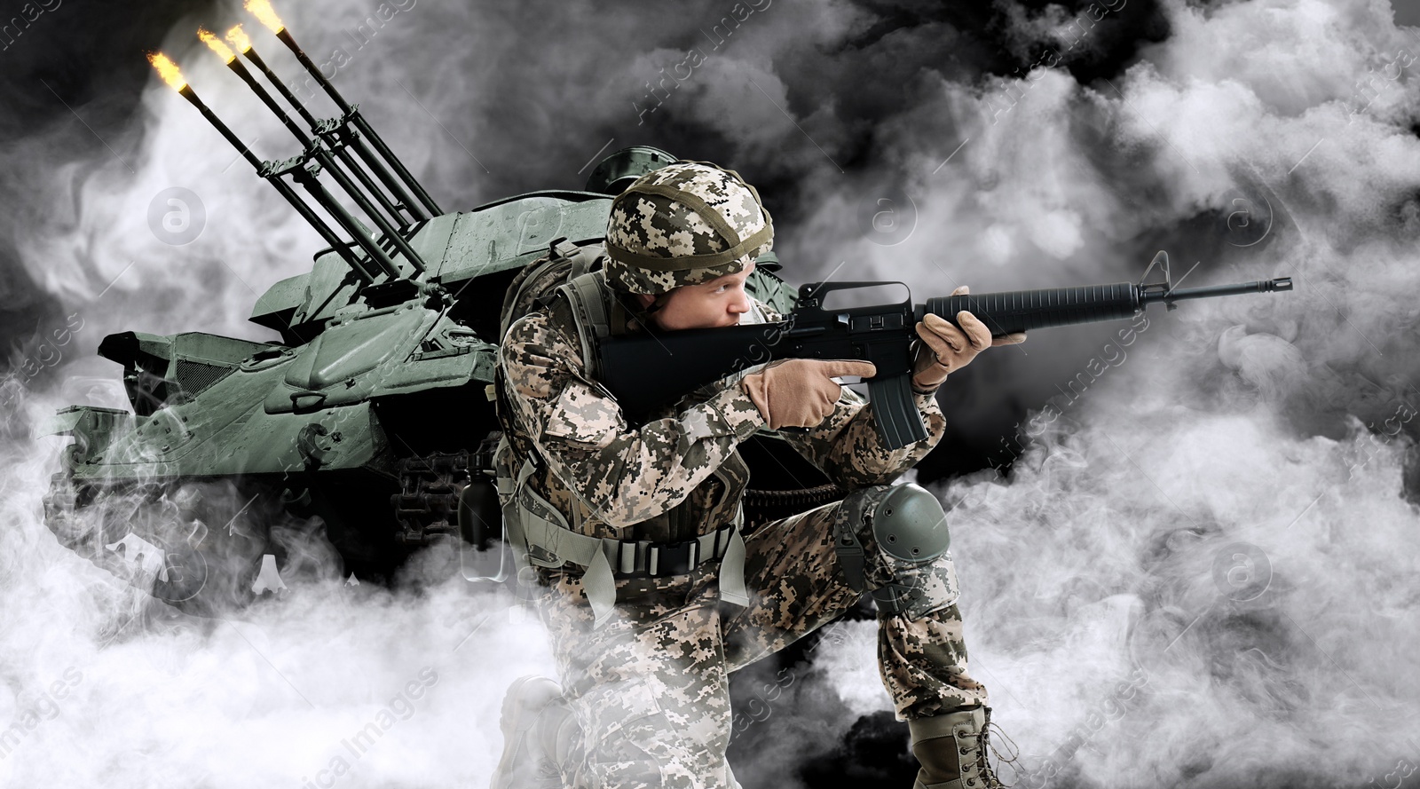 Image of Armed soldier and armored fighting vehicle in smoke