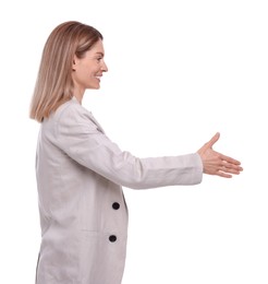Beautiful happy businesswoman giving handshake on white background