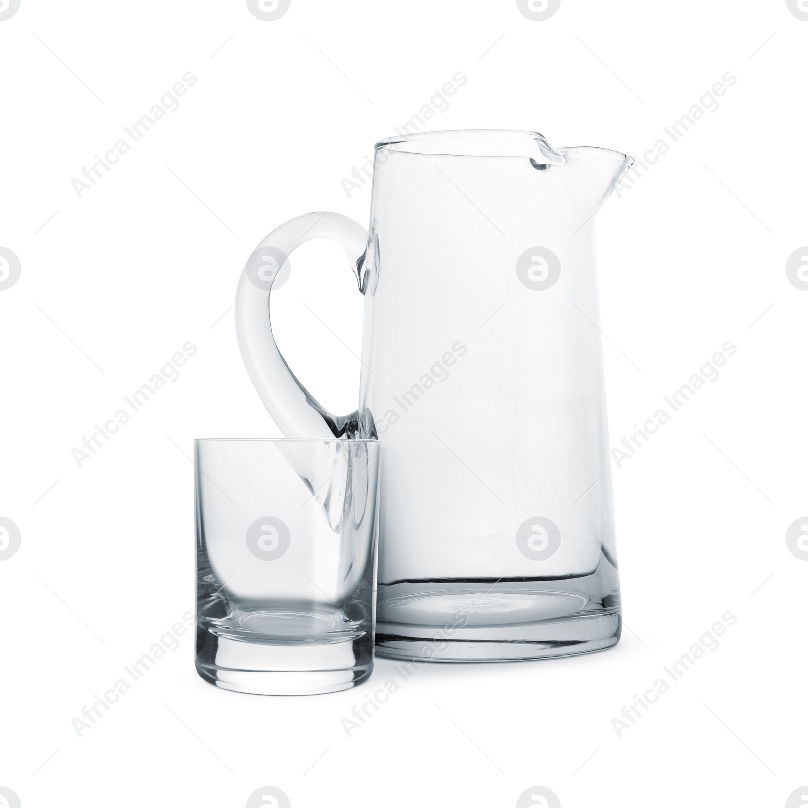 Image of Empty glass and jug isolated on white