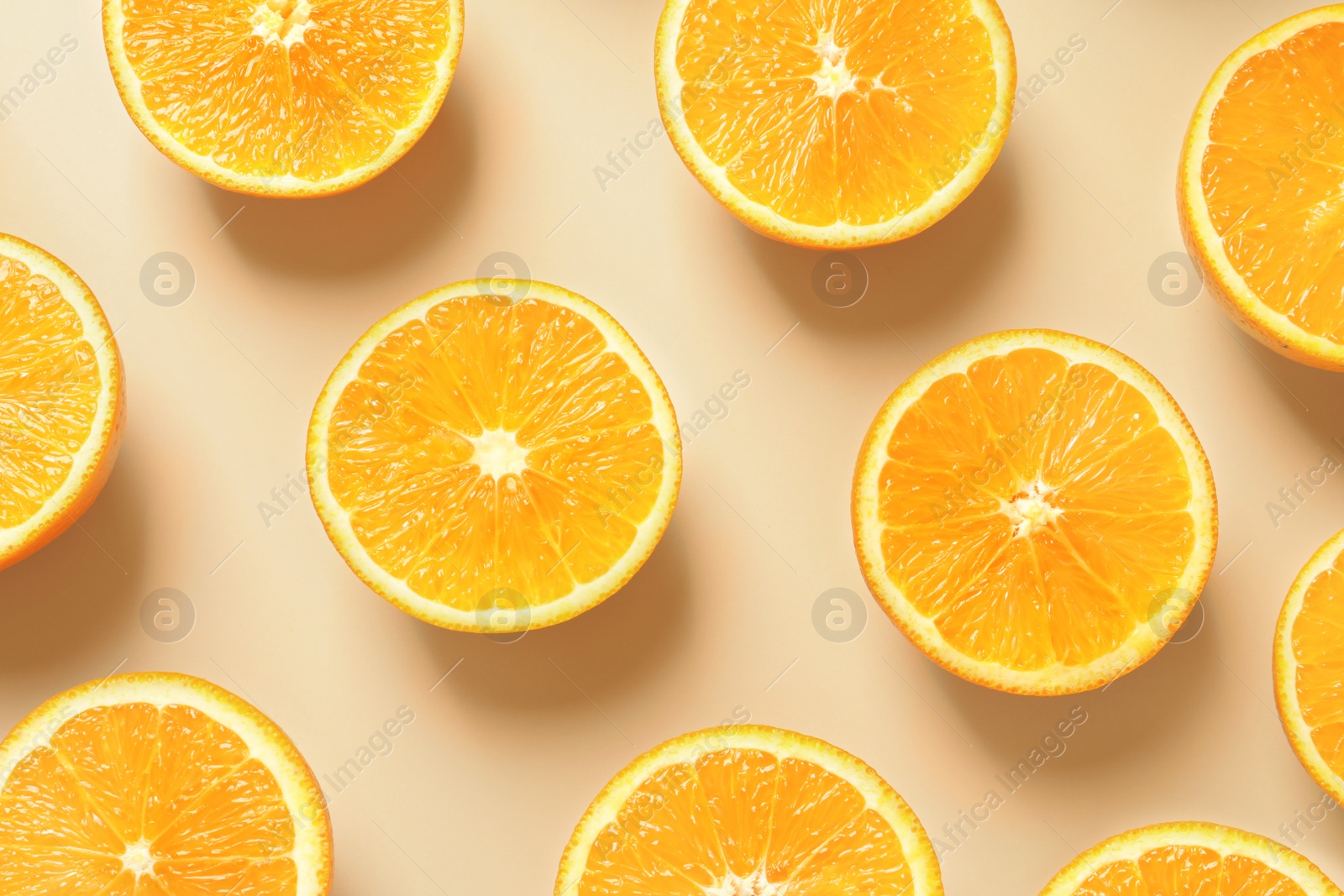 Photo of Flat lay composition with ripe oranges on color background