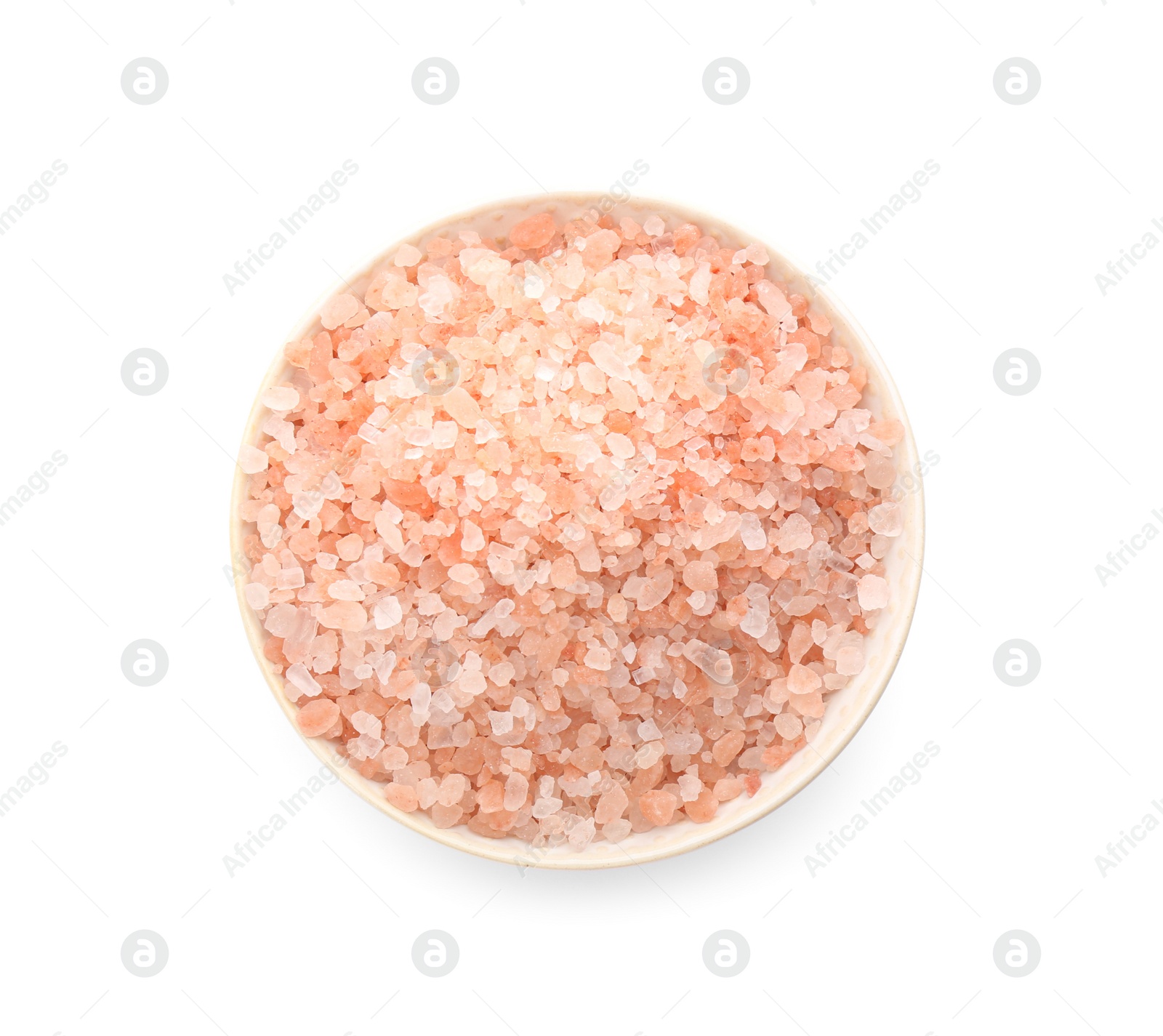 Photo of Pink himalayan salt in bowl isolated on white, top view