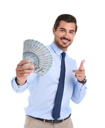 Handsome businessman with dollars on white background