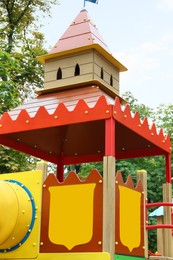 Photo of New colorful castle playhouse on children's playground