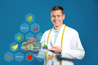 Nutritionist's recommendations. Doctor with healthy products on blue background