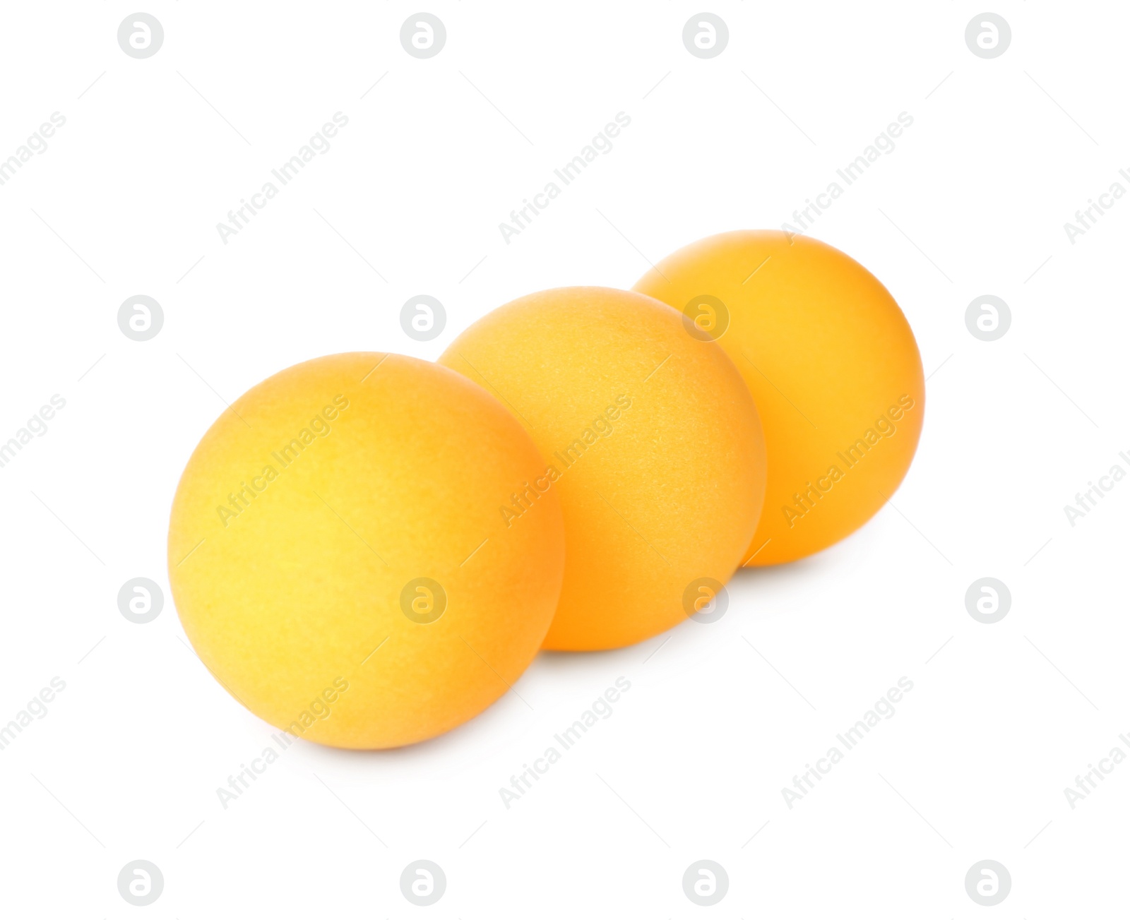 Photo of Orange ping pong balls isolated on white