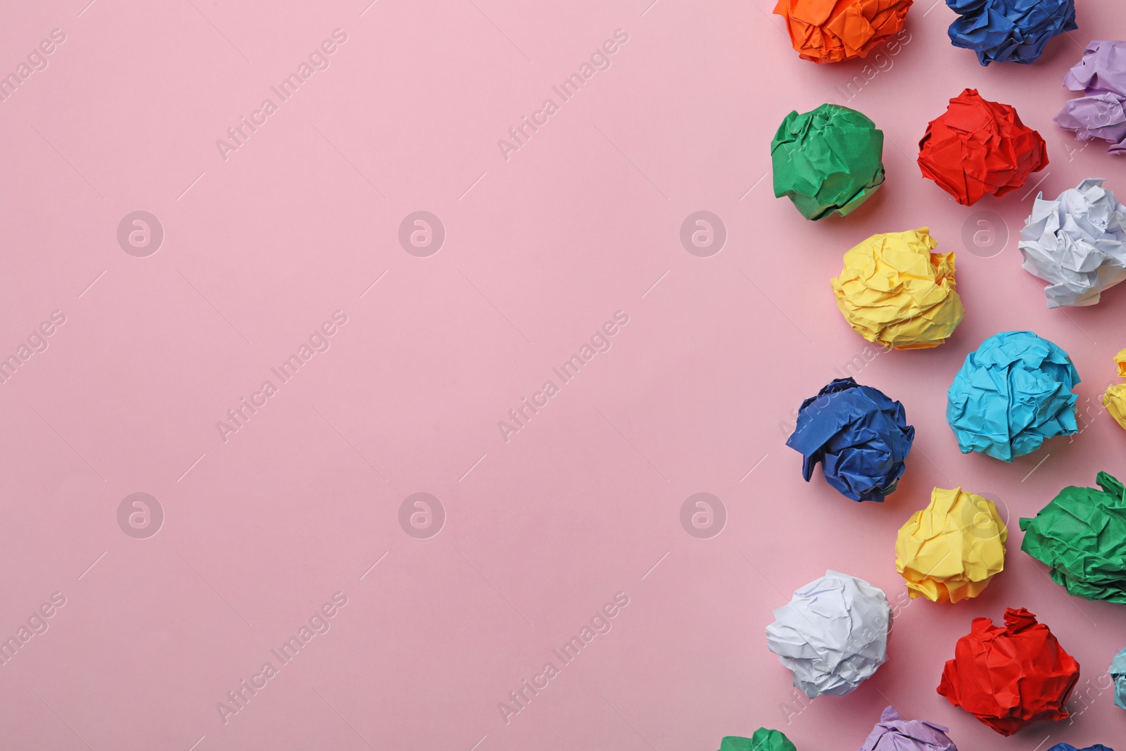 Photo of Paper balls on color background, flat lay. Space for text