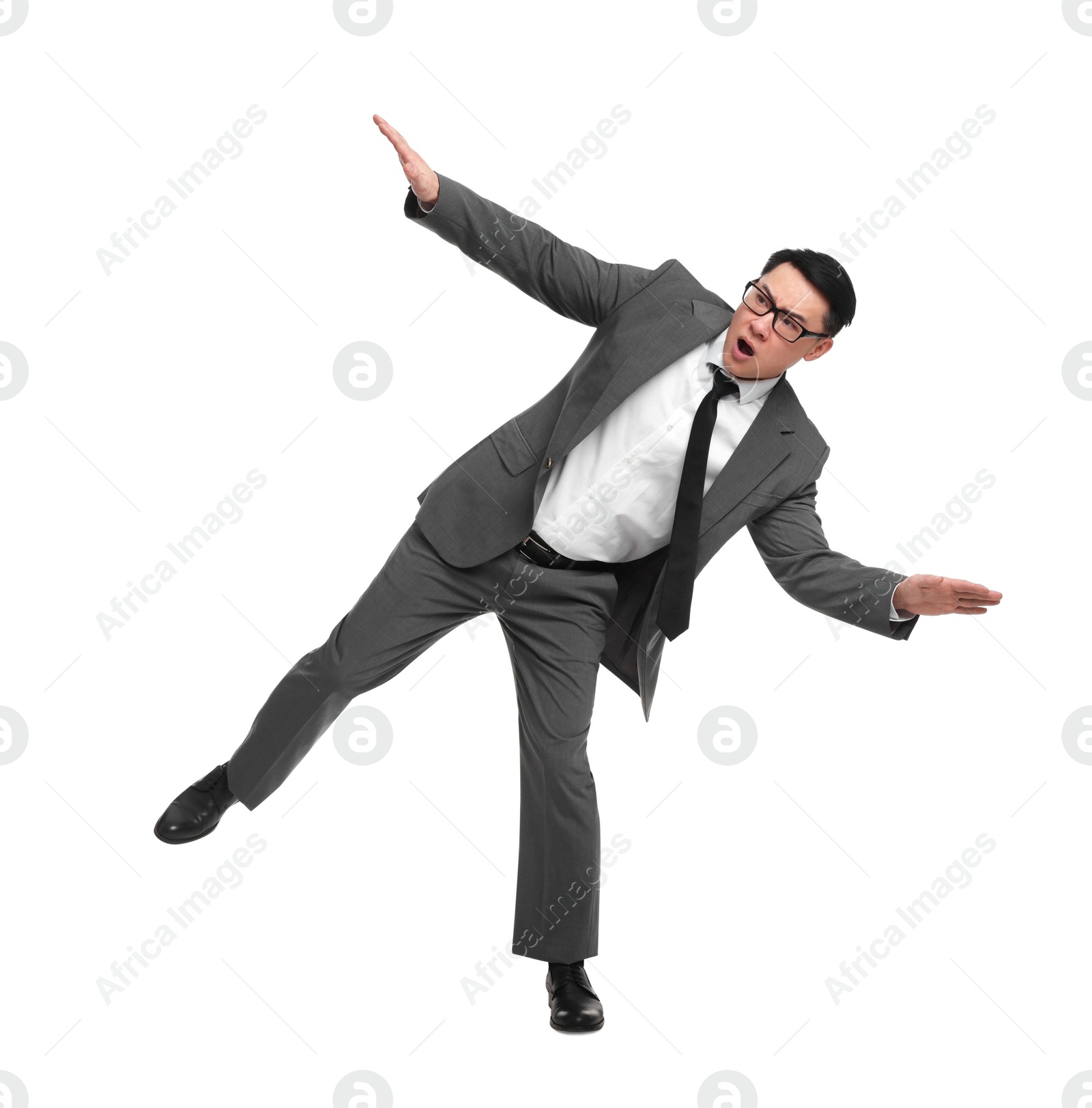 Photo of Businessman in suit posing on white background