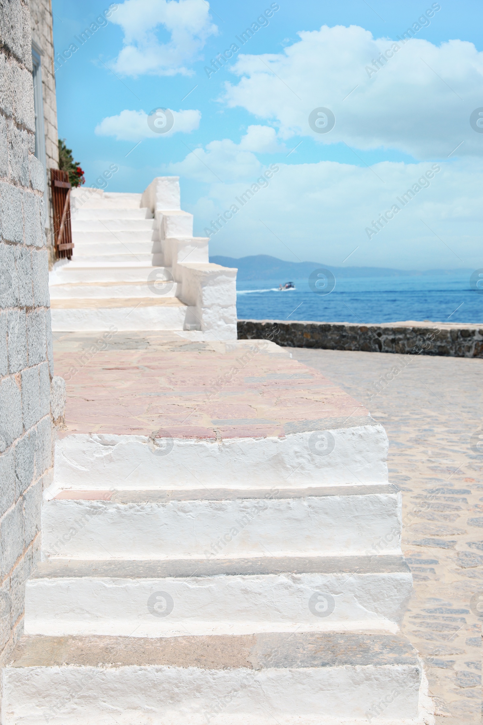 Photo of Beautiful terrace with old stone stairs on sunny day