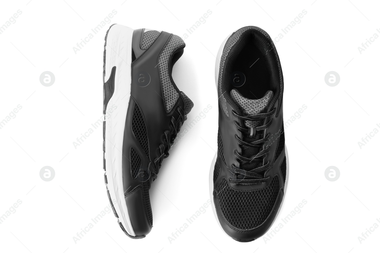 Photo of Stylish sport shoes on white background, top view. Trendy footwear