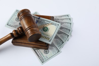 Judge's gavel and money on white background. Space for text