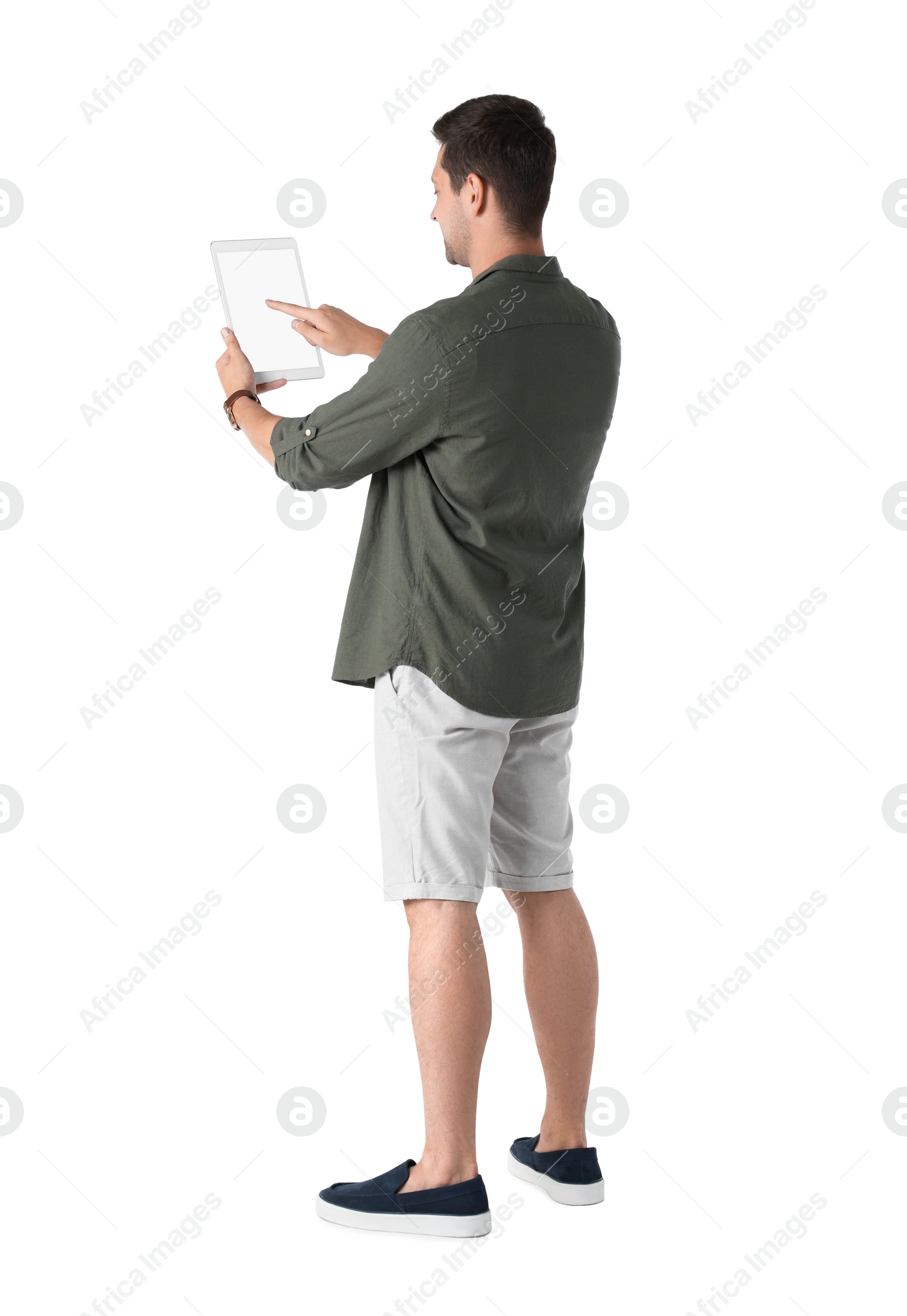 Photo of Man using tablet with blank screen on white background