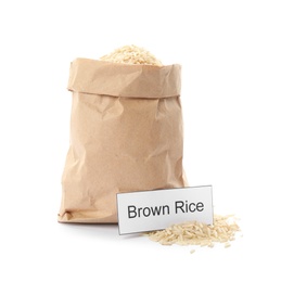 Photo of Paper bag with uncooked brown rice and card on white background