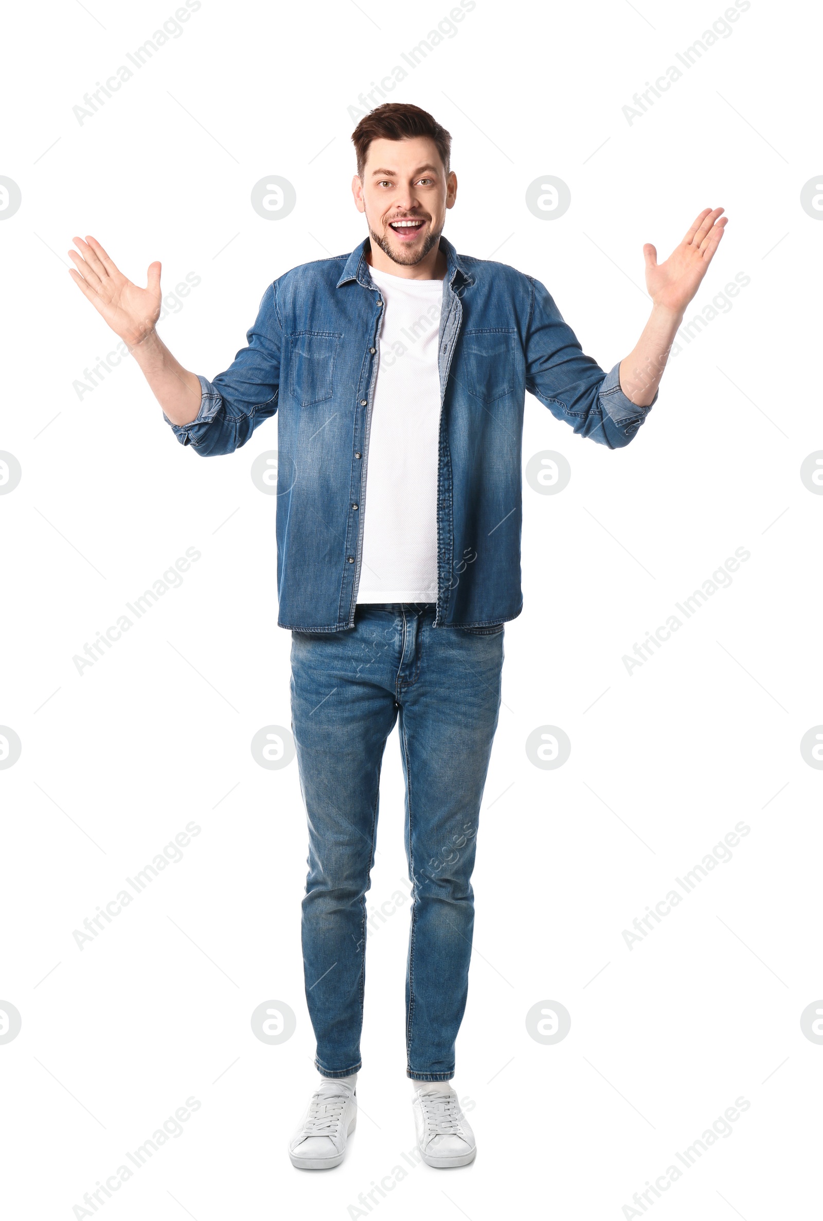 Photo of Full length portrait of emotional handsome man on white background