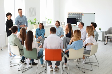 Young people having business training in office