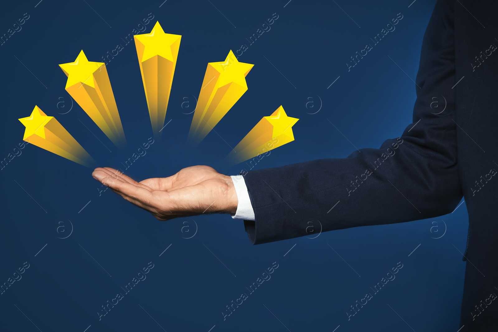 Image of Man showing icons of five stars on blue background, closeup. Quality rating