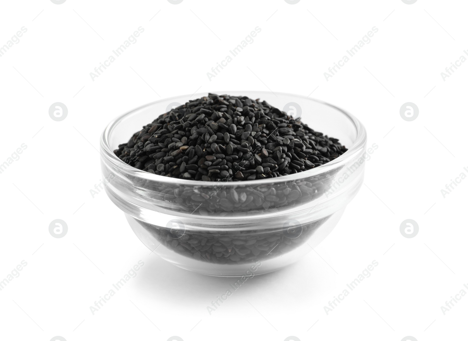 Photo of Black sesame seeds in bowl on white background. Delicious sauce condiment