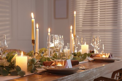 Festive table setting with beautiful tableware and decor indoors