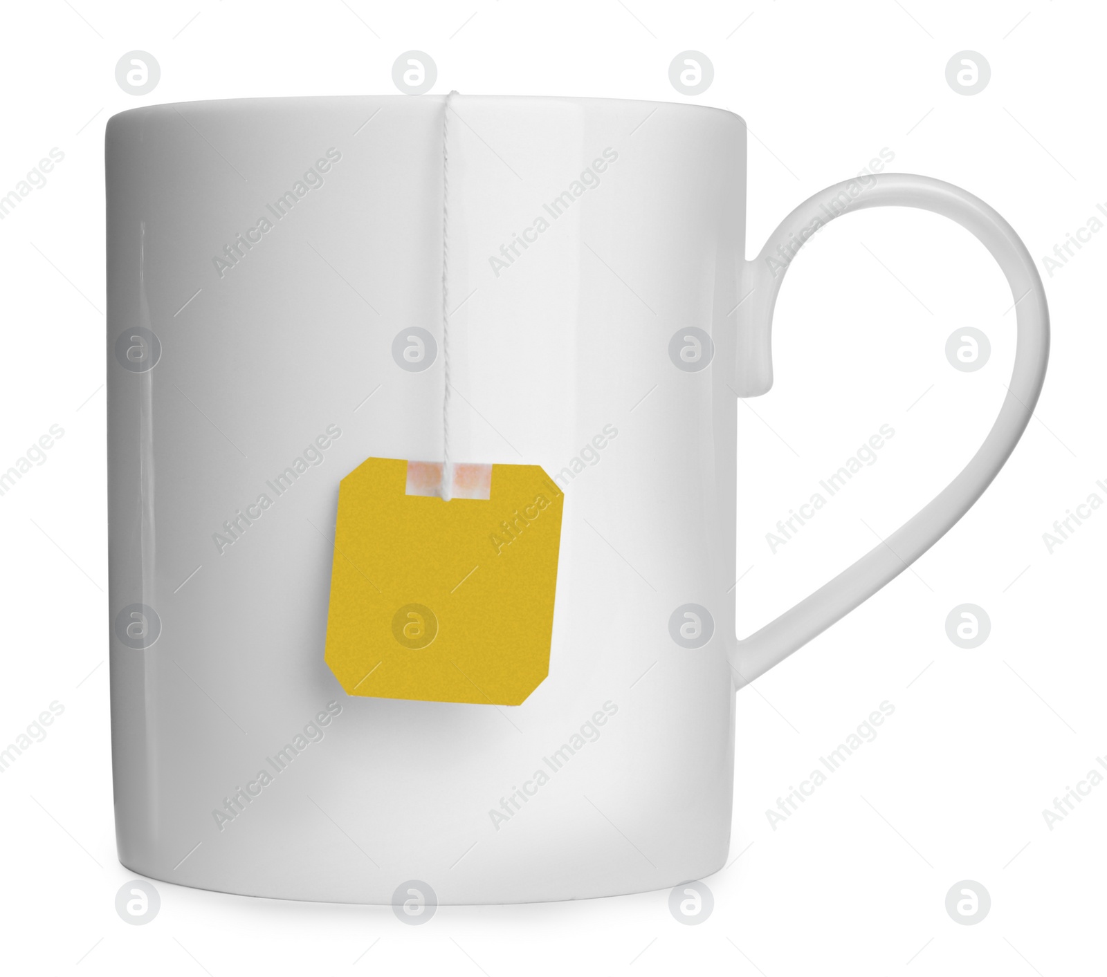 Photo of Ceramic cup with teabag isolated on white