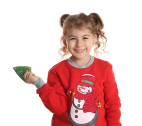 Cute little girl with Christmas gingerbread cookie on white background