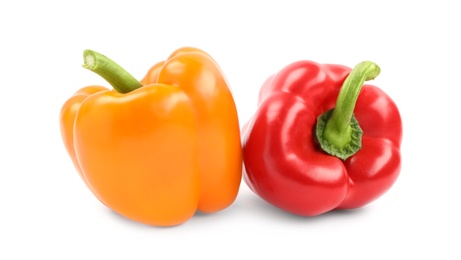 Photo of Fresh ripe bell peppers on white background