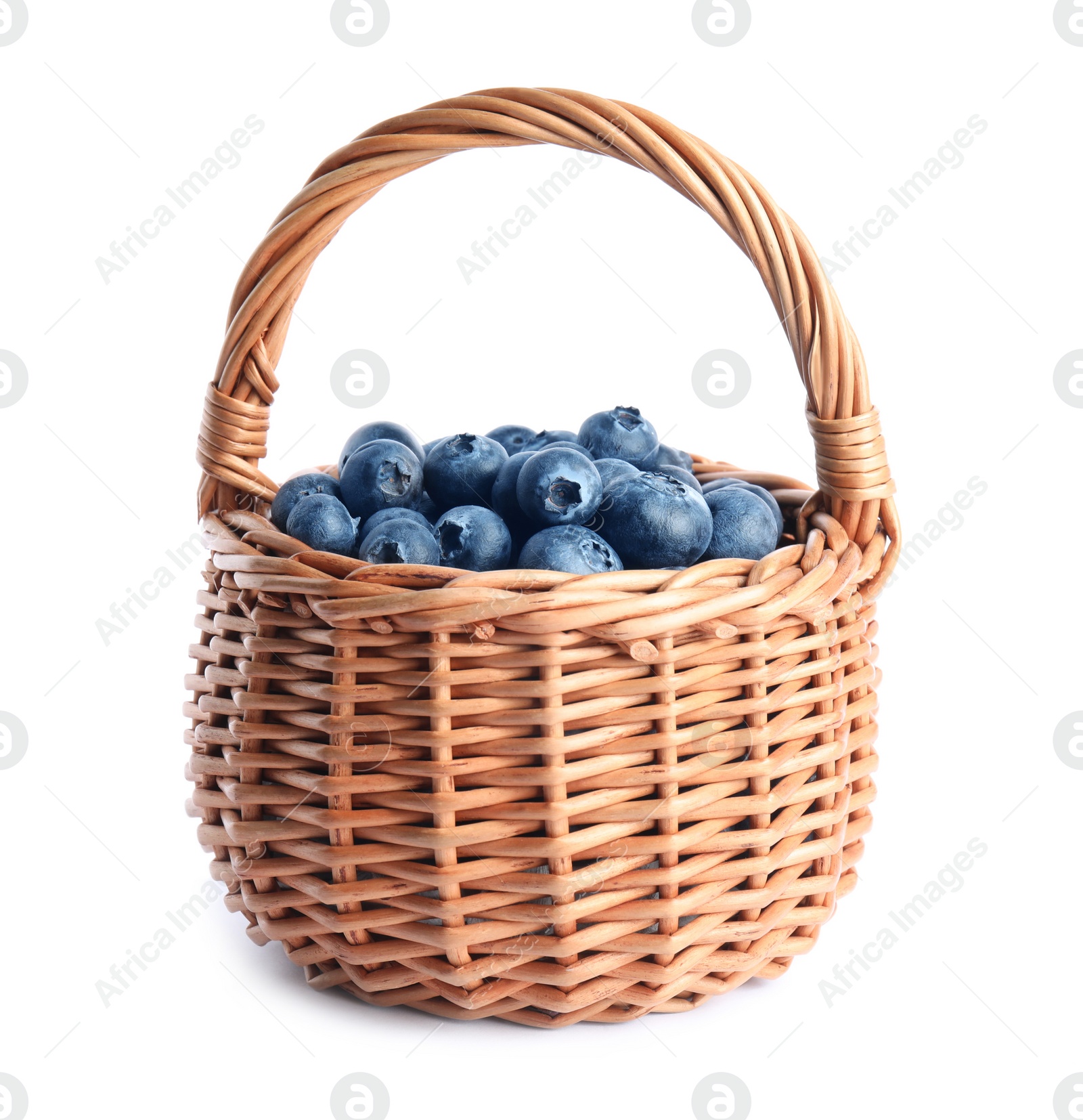 Photo of Fresh tasty blueberries in wicker basket isolated on white