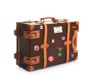 Image of Retro suitcase with travel stickers on white background