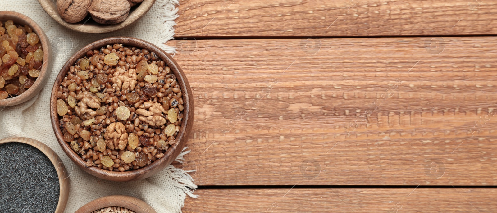 Image of Traditional Christmas slavic dish kutia served on wooden table, flat lay, space for text. Banner design