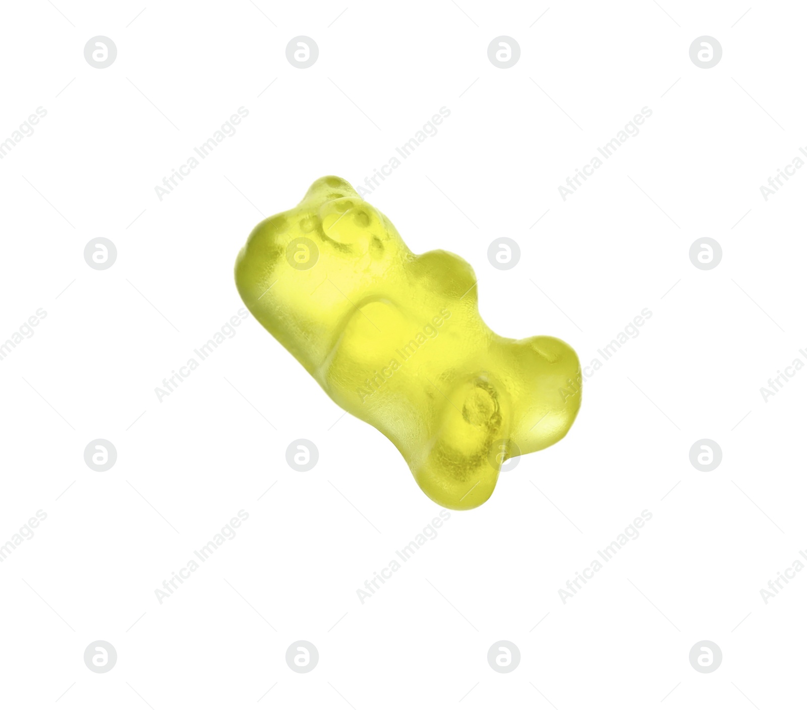 Photo of Delicious yellow jelly bear on white background