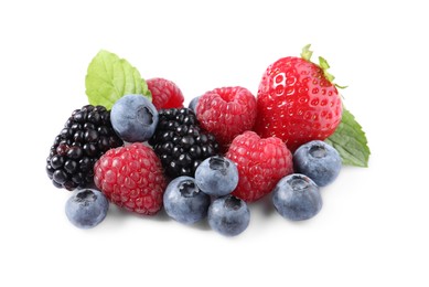 Photo of Many different ripe berries and mint leaves isolated on white