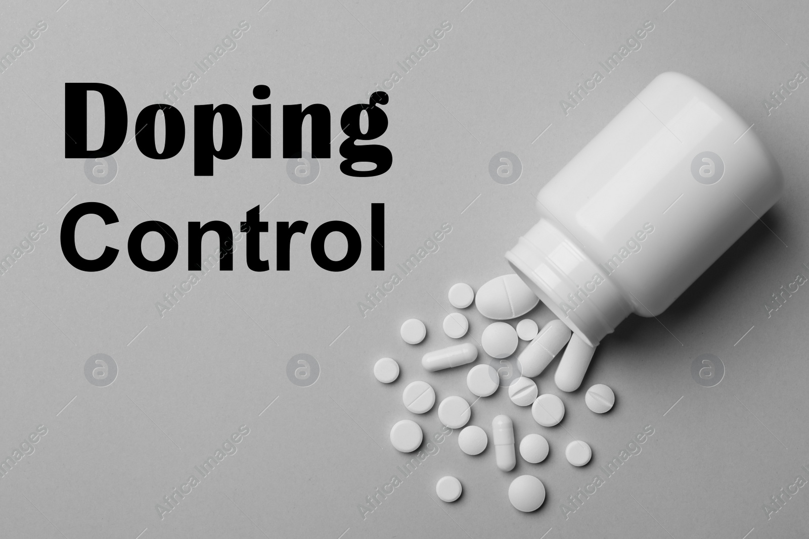 Image of Bottle with drugs on grey background, flat lay. Doping control 