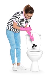 Photo of Woman cleaning toilet bowl in bathroom