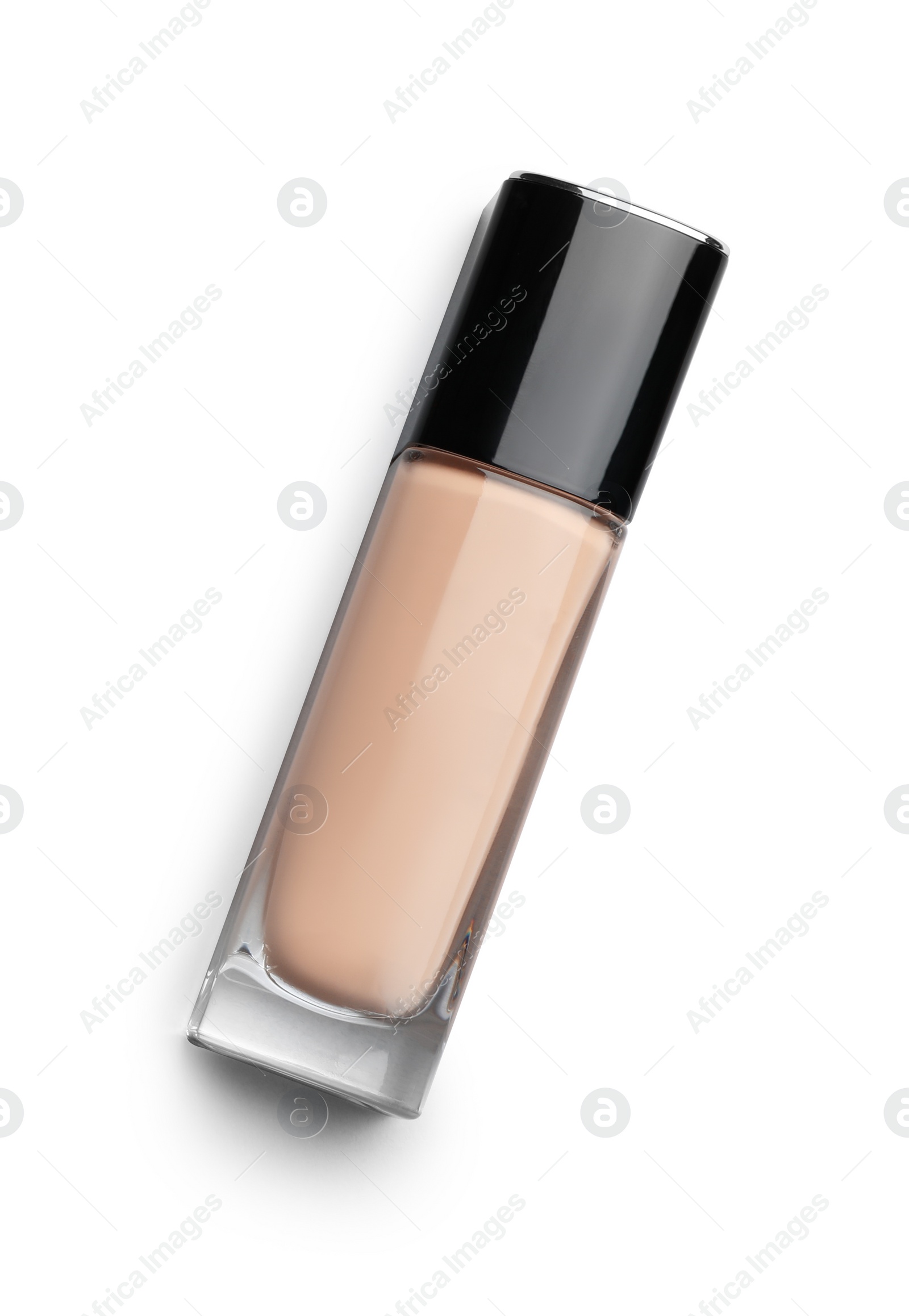 Photo of Bottle of skin foundation and space for text on light background, top view