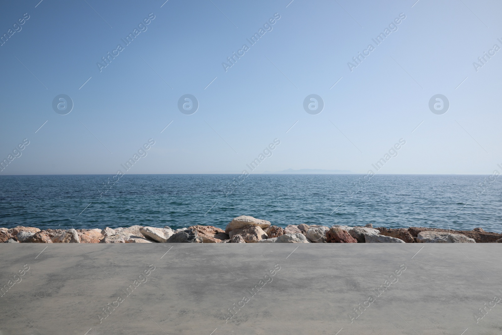 Photo of Beautiful view of embankment and calm sea on sunny day