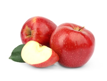 Ripe juicy red apples with leaf on white background