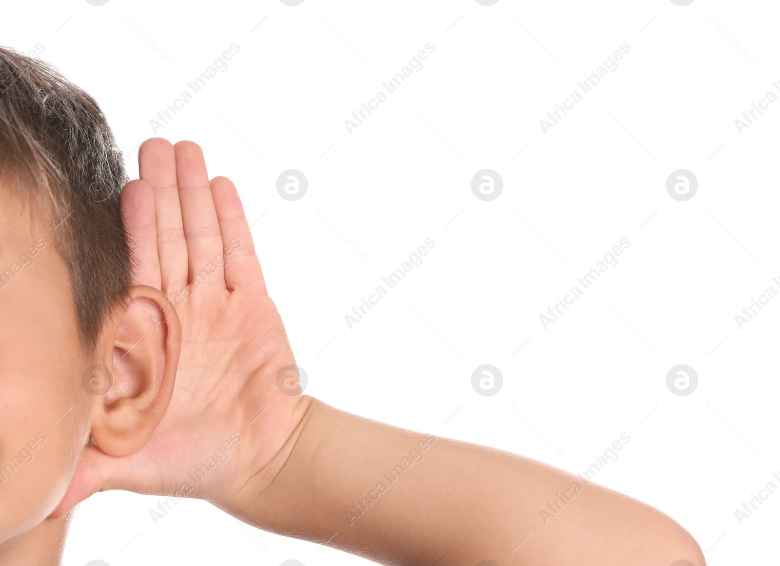 Photo of Cute little boy with hearing problem on white background, closeup