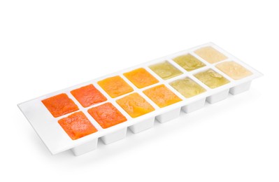 Photo of Different purees in ice cube tray isolated on white. Ready for freezing