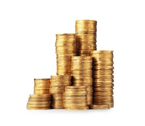 Many golden coins stacked on white background
