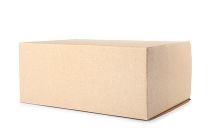 Photo of Closed cardboard box on white background. Mockup for design