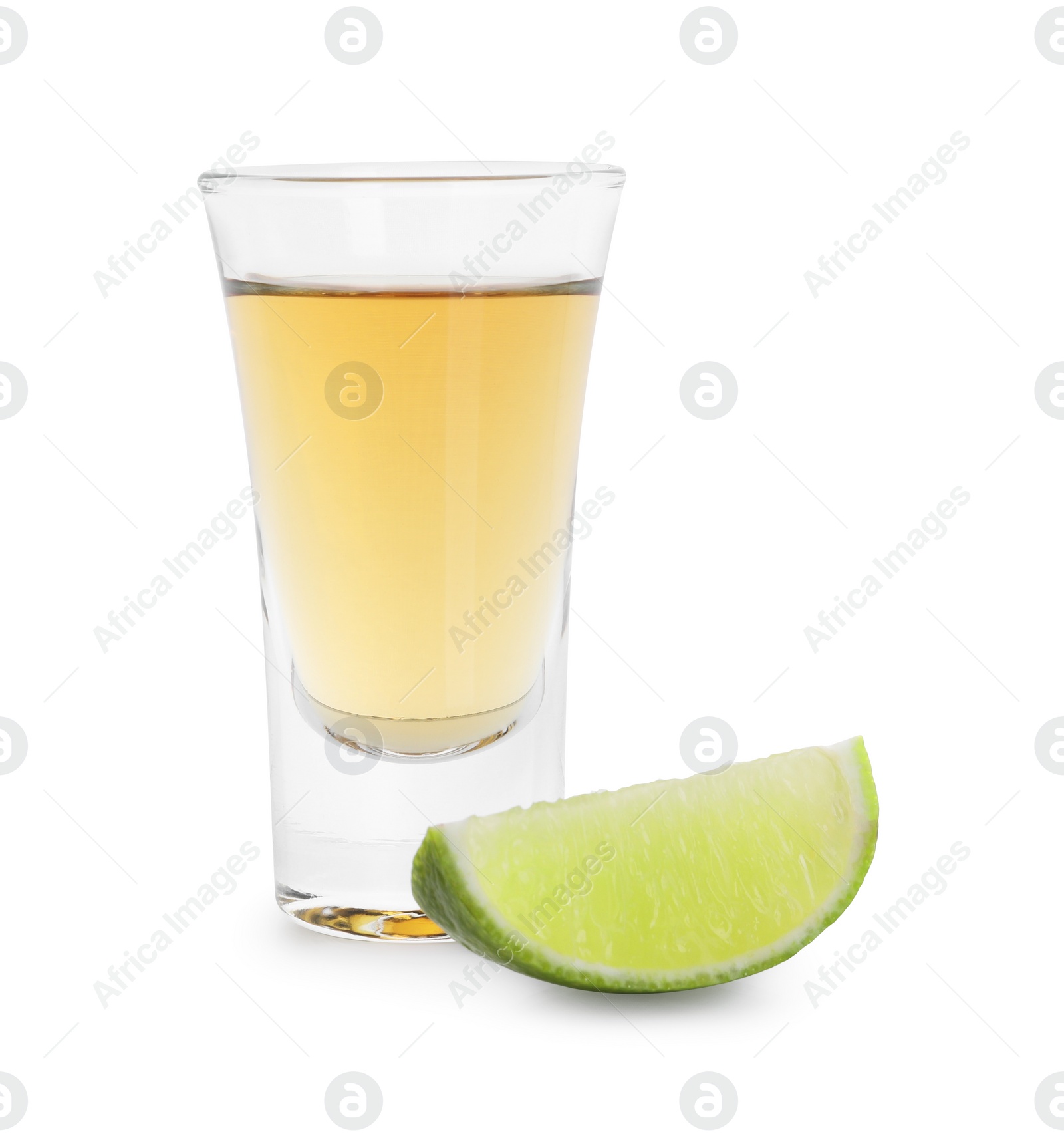 Photo of Shooter in shot glass and lime wedge isolated on white. Alcohol drink