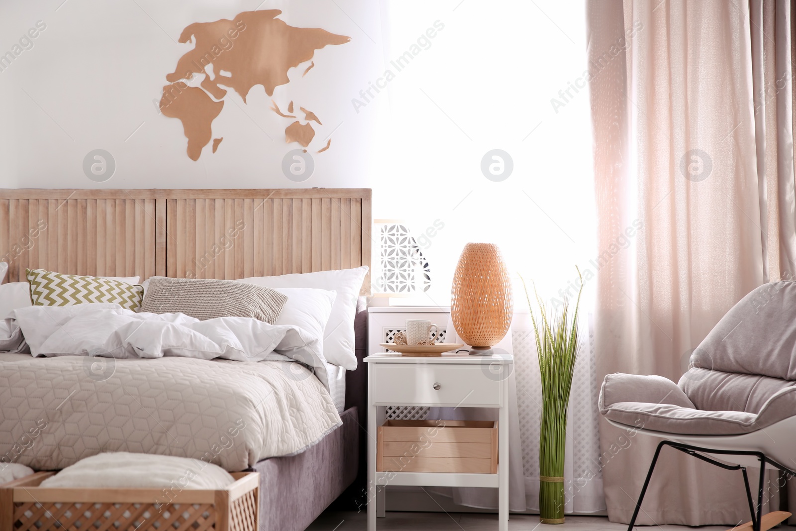 Photo of Modern eco style interior with wooden crates and comfortable bed