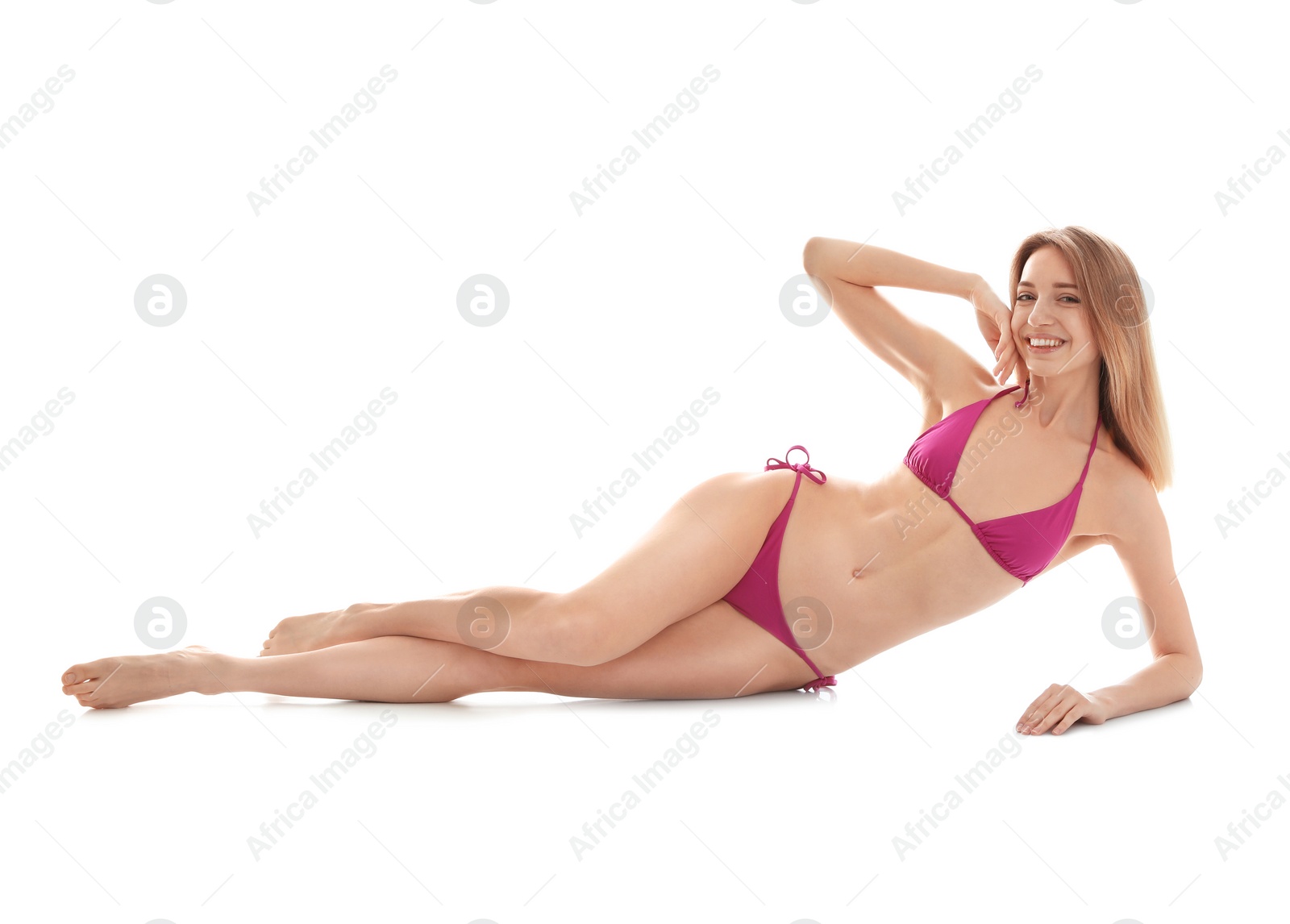 Photo of Young slim woman in bikini on white background. Perfect body