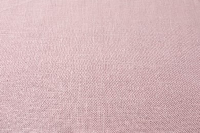 Photo of Texture of pink fabric as background, closeup