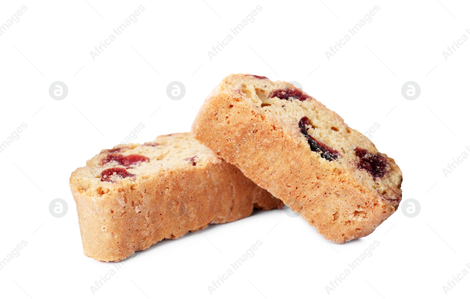 Photo of Slices of tasty cantucci with berry on white background. Traditional Italian almond biscuits