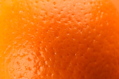 Photo of Delicious unpeeled orange fruit as background, closeup