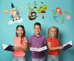 Image of Happy children reading books on light blue background