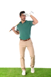 Young man posing with golf club on white background