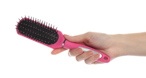 Photo of Woman holding modern hair brush on white background, closeup