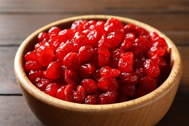 Photo of Bowl of sweet cherries on table, closeup. Dried fruit as healthy snack
