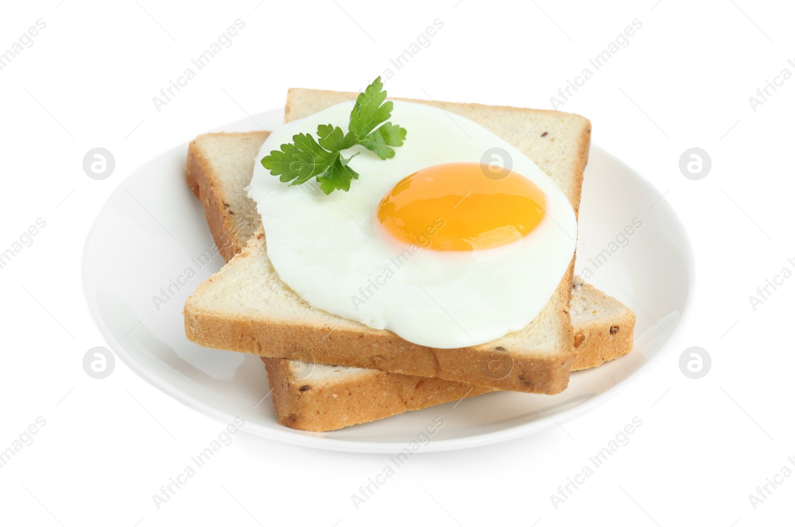 Photo of Tasty fried chicken egg with bread and parsley isolated on white